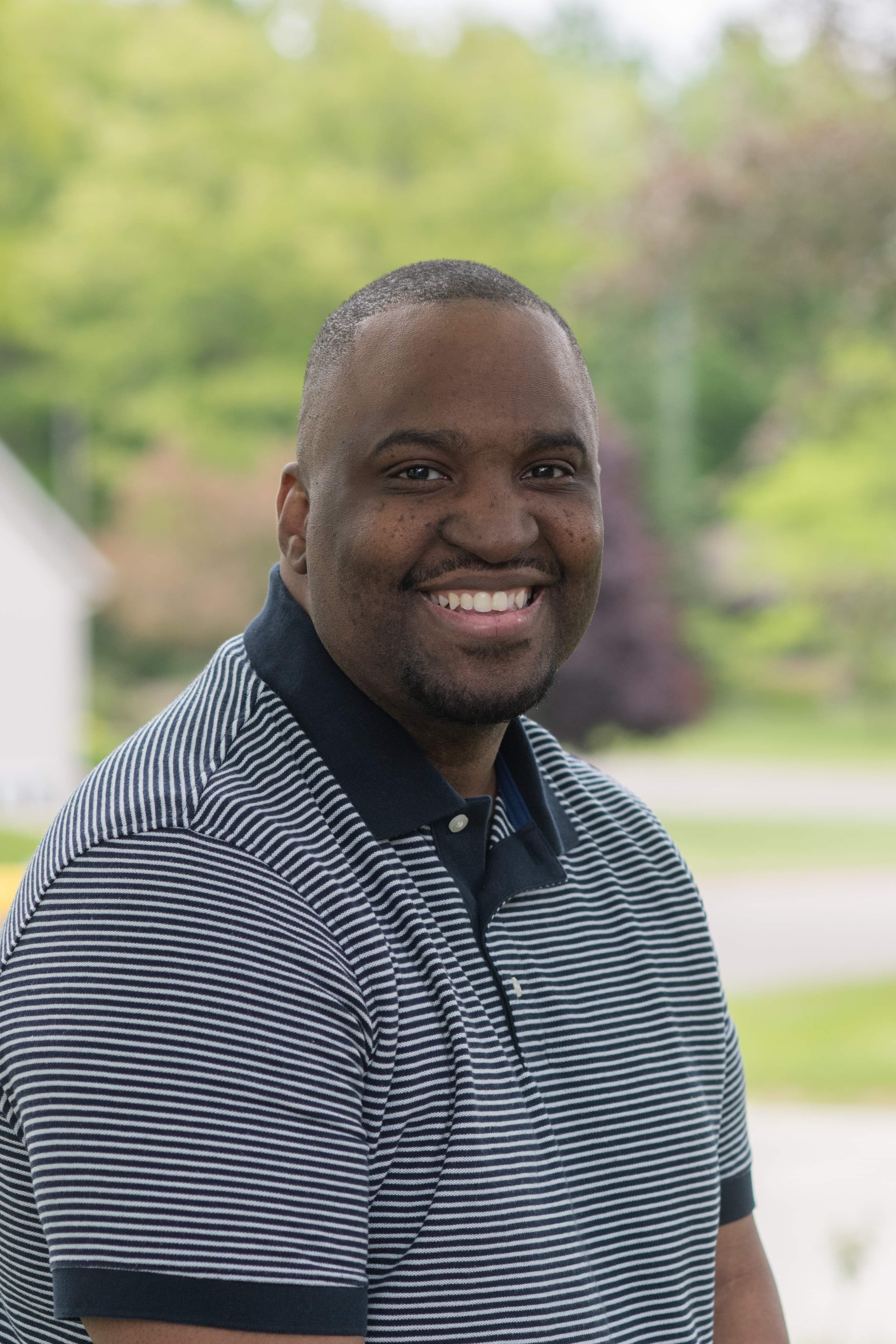 Coach Brown smiling